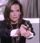 Sue-Ellen with a gun