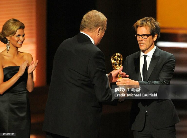 Actor Ken Howard accepts the award from actor Kevin Bacon for Outstanding Supporting Actor in a Miniseries or Movie for " Grey Gardens" at the 61st Primetime Emmy Awards held at the Nokia Theatre on September 20, 2009 in Los Angeles, California. (Photo by Michael Caulfield/FilmMagic)