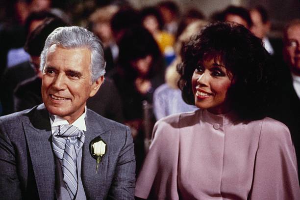 THE COLBYS - "The Wedding" - Airdate March 20, 1986. (Photo by ABC Photo Archives/Disney General Entertainment Content via Getty Images) JOHN FORSYTHE;EMMA SAMMS
