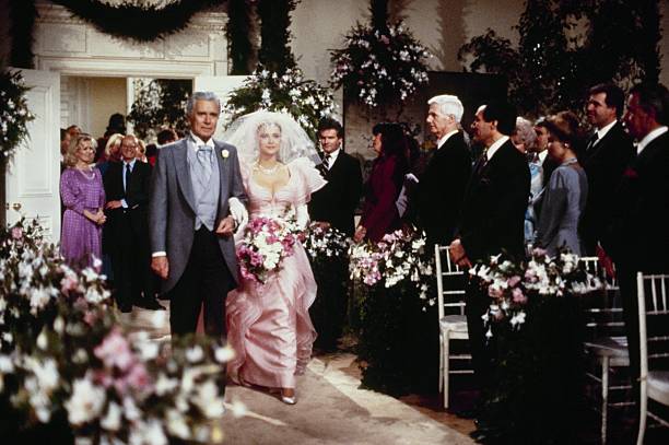 THE COLBYS - "The Wedding" - Airdate March 20, 1986. (Photo by ABC Photo Archives/Disney General Entertainment Content via Getty Images) JOHN FORSYTHE;EMMA SAMMS