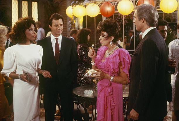 DYNASTY - "The Garage" - Airdate March 11, 1987. (Photo by ABC Photo Archives/Disney General Entertainment Content via Getty Images) DIAHANN CARROLL;MICHAEL NADER;JOAN COLLINS;JOHN CYPHER