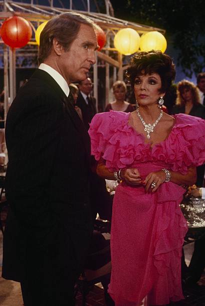 DYNASTY - "The Garage" - Airdate March 11, 1987. (Photo by ABC Photo Archives/Disney General Entertainment Content via Getty Images) JOHN CYPHER;JOAN COLLINS