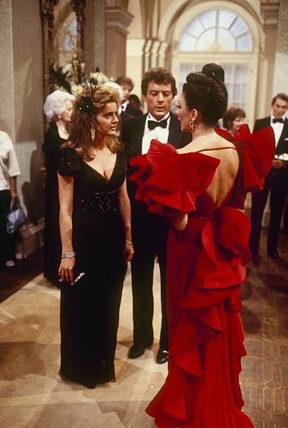 DYNASTY - "The Ball" - Airdate December 17, 1986. (Photo by ABC Photo Archives/Disney General Entertainment Content via Getty Images) KAREN CELLINI;WAYNE NORTHROP;JOAN COLLINS
