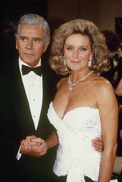 DYNASTY - "The Ball" - Airdate December 17, 1986. (Photo by ABC Photo Archives/Disney General Entertainment Content via Getty Images) JOHN FORSYTHE;LINDA EVANS