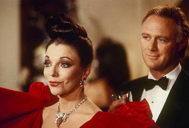 DYNASTY - "The Ball" - Airdate December 17, 1986. (Photo by ABC Photo Archives/Disney General Entertainment Content via Getty Images) JOAN COLLINS;CHRISTOPHER CAZENOVE