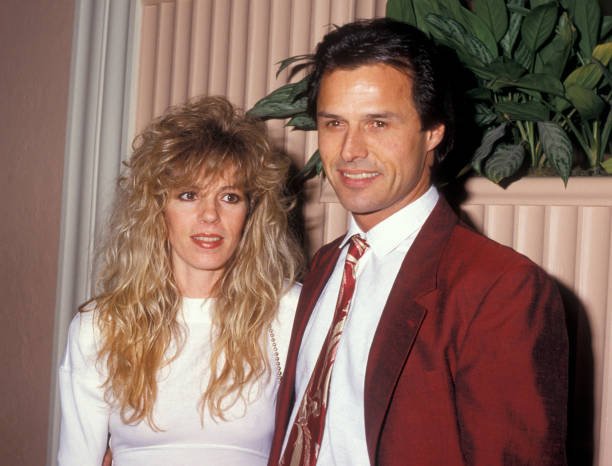 BEVERLY HILLS, CA - APRIL 5: Actor Michael Nader and Robin Nader attending "Dynasty Wrap Party" on April 5, 1987 at the Beverly Hills Hotel in Beverly Hills, California. (Photo by Ron Galella, Ltd./Ron Galella Collection via Getty Images)
