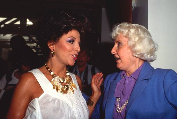LOS ANGELES - SEPTEMBER 19: Actresses Joan Collins and Barbara Stanwick attend a private showing of "The Dynasty Collection" on Sept 19, 1987 in Los Angeles, California. The showing is to showcase some of the costumes designed by Nolan Miller, that appear on the series. (Photo by Joan Adlen/Getty Images)