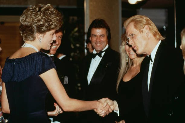 Diana, Princess of Wales  (1961 - 1997) meets actor Nick Nolte at the premiere of the film 'Prince of Tides' in London, UK, 18th February 1992. Co-star Jeroen Krabbé is in the centre. (Photo by Princess Diana Archive/Getty Images)