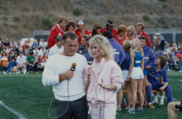 Malibu, CA - 1983: (L-R) Robert Conrad, Donna Mills appearing on the ABC tv special 'Battle of the Network Stars XIV', at Pepperdine University. (Photo by Bob Long /American Broadcasting Companies via Getty Images)