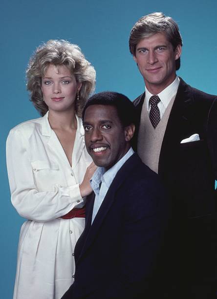 MANIMAL -- Season 1 -- Pictured: (l-r) Melody Anderson as Brooke MacKenzie, Michael D. Roberts as Tyrone C. Earl, Simon MacCorkindale as Dr. Jonathan Chase -- Photo by: Herb Ball/NBCU Photo Bank
