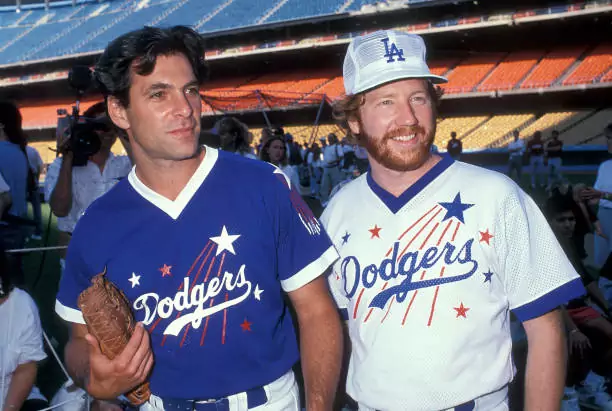 LOS ANGELES - AUGUST 26: Actor Ken Olin and actor Timothy Busfield attend the 32nd Annual "Hollywood Stars Night" Celebrity Baseball Game on August 26, 1989 at Dodger Stadium in Los Angeles, California. (Photo by Ron Galella, Ltd./Ron Galella Collection via Getty Images)