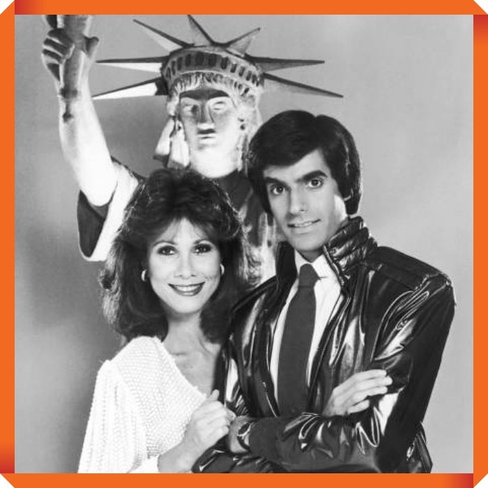 American magician David Copperfield with actress and singer Michele Lee, who is to guest star in the illusionist's upcoming CBS special, entitled 'The Magic of David Copperfield V: The Statue of Liberty Disappears', 1983. (Photo by Archive Photos/Getty Images)